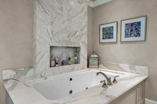 Marble surround whirlpool tub and vanity!