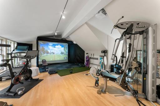 Just part of this room is currently used as a golf simulator! A golfers dream!