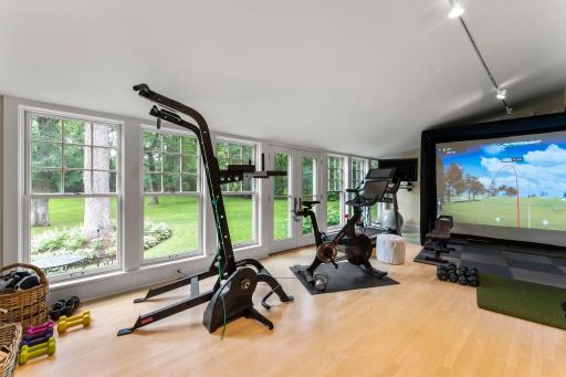 Floor to ceiling windows with patio doors to the rear of the home!