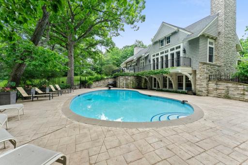 Pool area surrounded by trees for privacy!