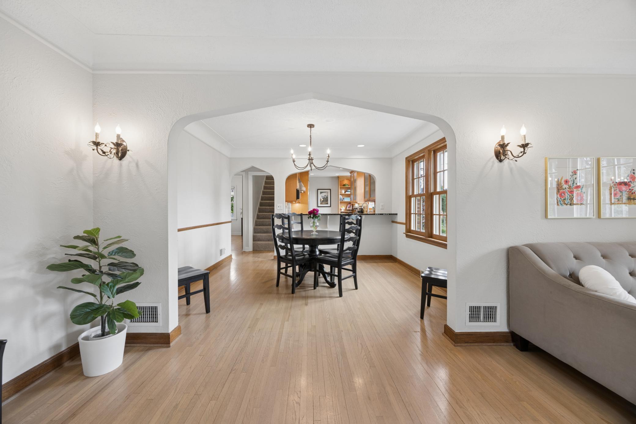 Original narrow plank flooring with pickle finish. Period specific light sconces.