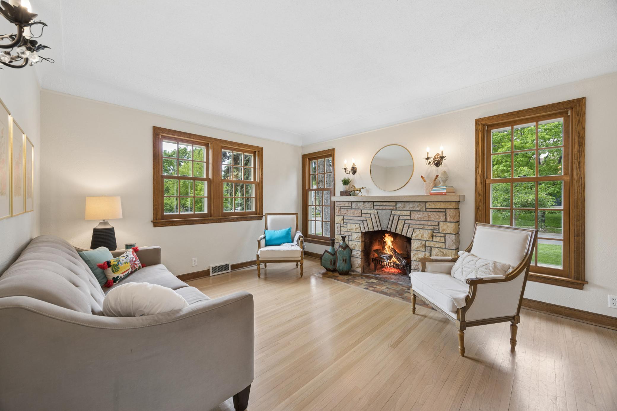 So much natural light. This large front room has plenty of options for furniture placement.