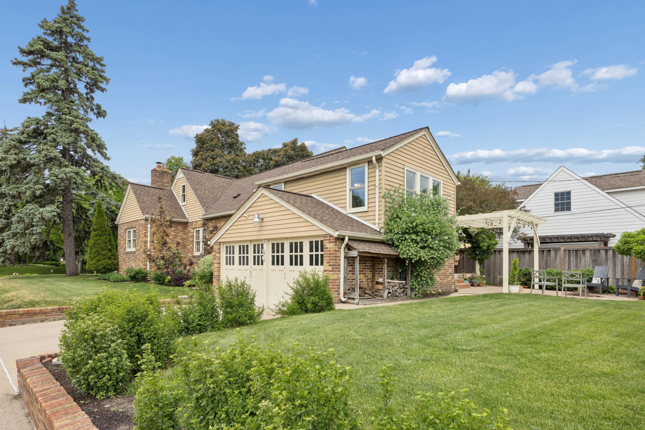 Meticulously maintained easy care perennials. Enjoy the side yard - great for yard games or a garden.