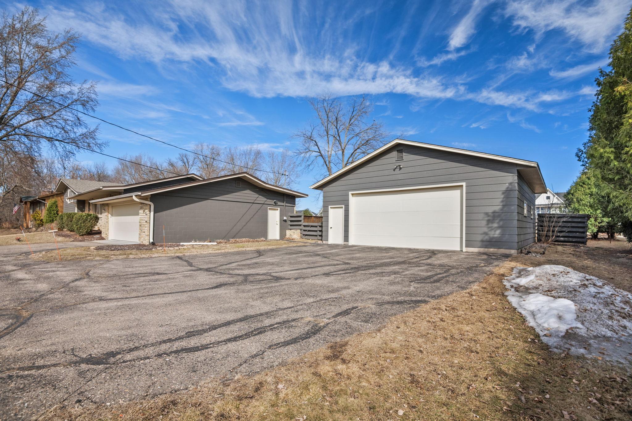 2 car attached and 978 SQ FT detached 2 car garage