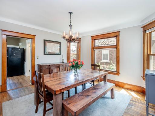 Natural light floods the formal dining area.