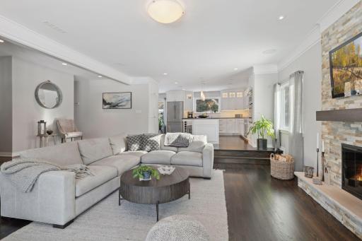 Open floor plan from the living room to the kitchen with gleaming hardwood floors