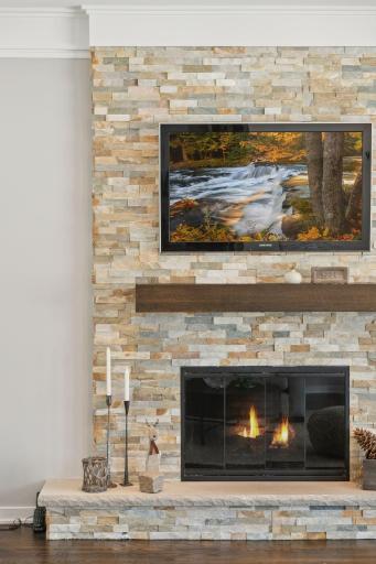 Amazing stone fireplace featured in the living room