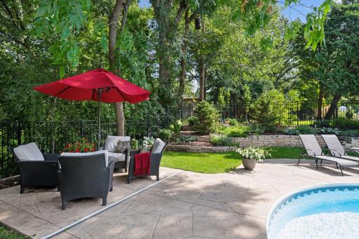 Gather with family and friends next to the pool