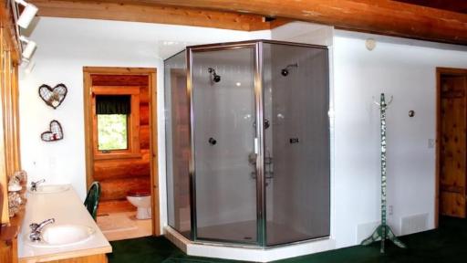 Photo for 2450 Keyes Island, International Falls, MN 56649 - Listing #6691973 Large walk-in shower in the primary bathroom