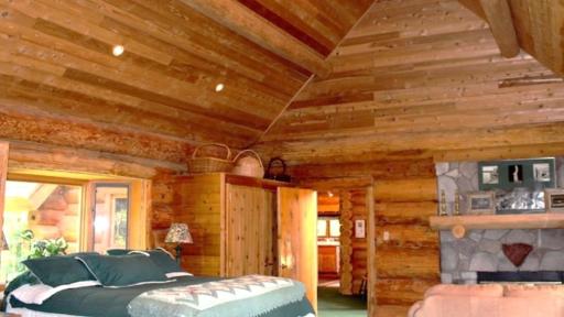 Photo for 2450 Keyes Island, International Falls, MN 56649 - Listing #6691973 Primary bedroom with wood burning fireplace