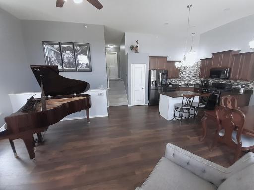 Main level looking upstairs to bedrooms and laundry