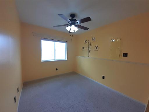 Bright and fresh lower level third bedroom