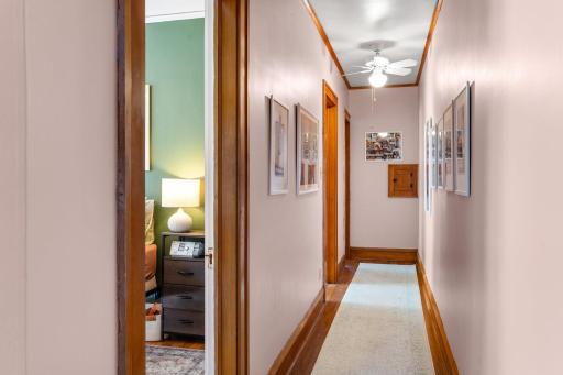 A wide hallway offers an expanse of wall space to display and create your personal art gallery.