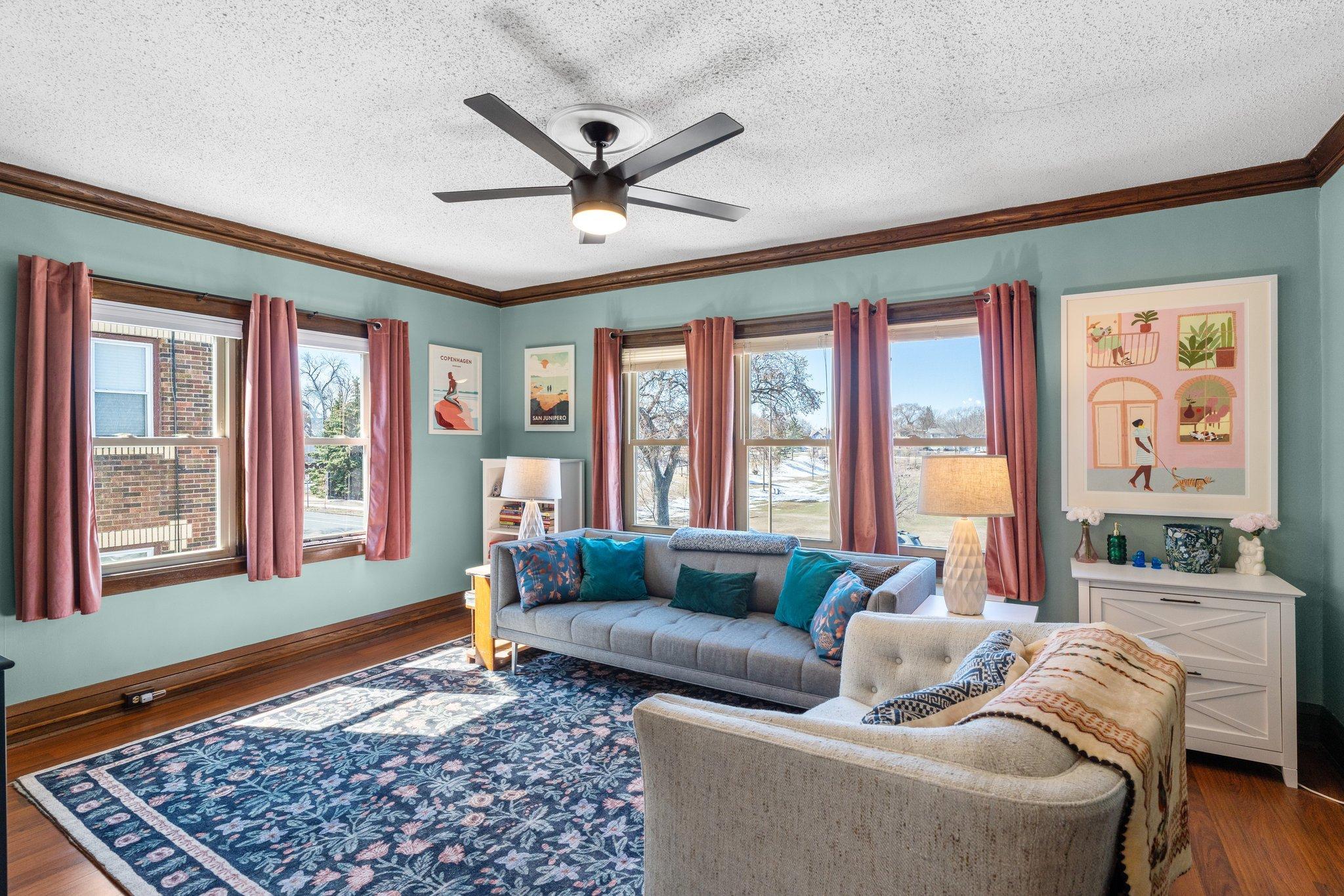 The wall of south and west-facing windows fill this home with an abundance of natural light!