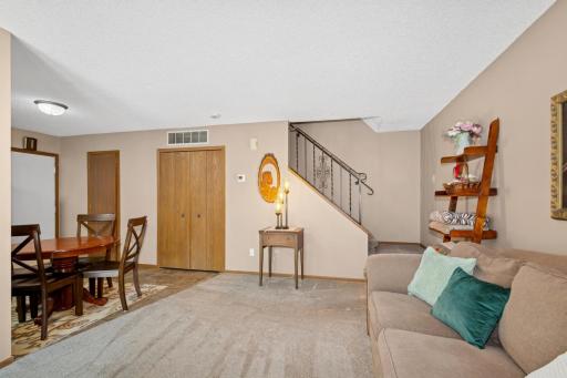 The living room is open to the dining area.
