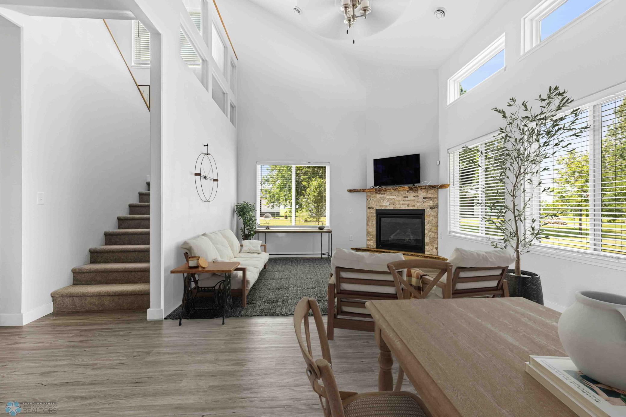 Vinyl Planking Flooring, Gas Fireplace, Living Room/Dining Room - Digitally Staged