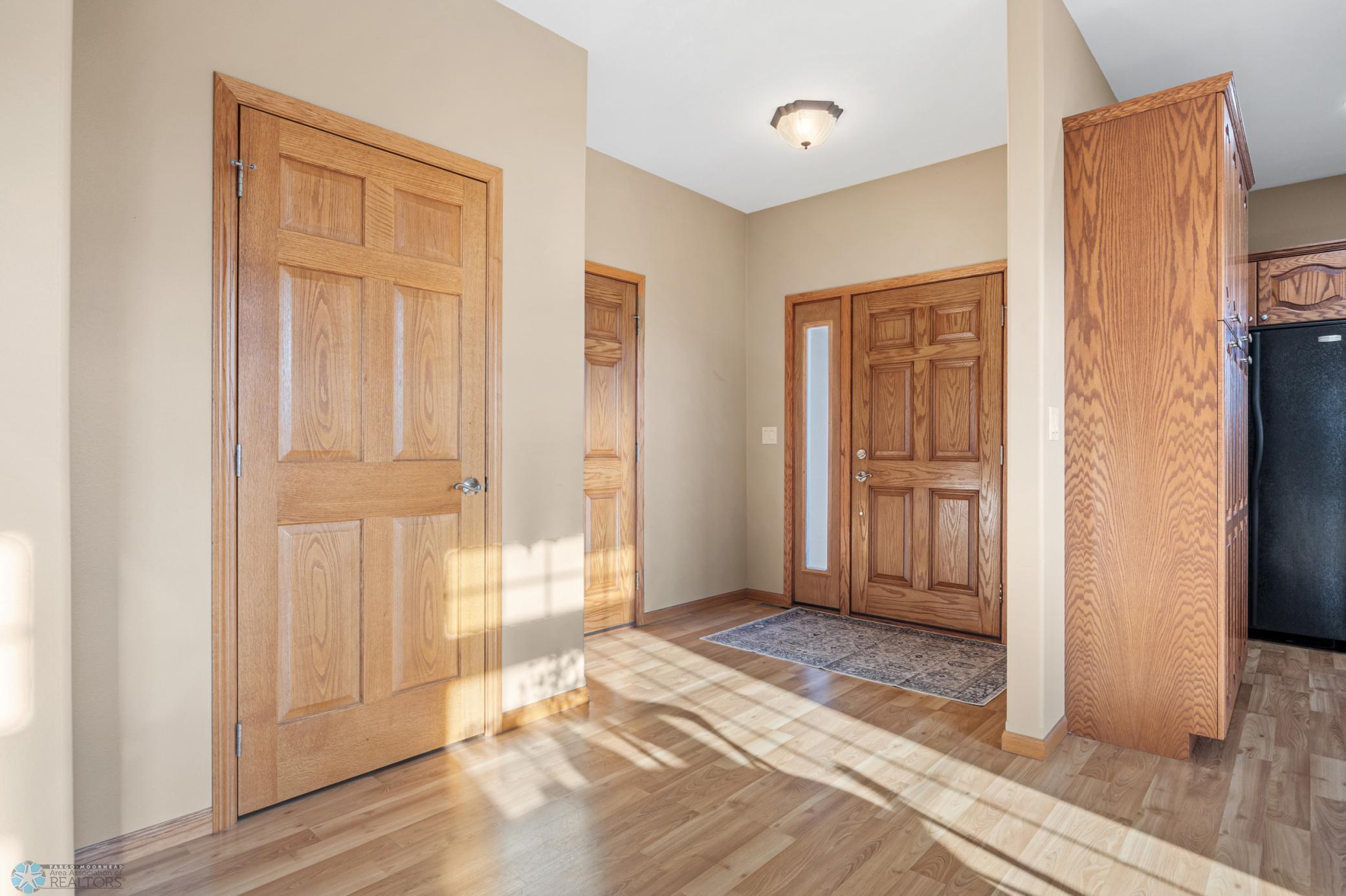Front Entry- Garage Access & Front Coat Closet