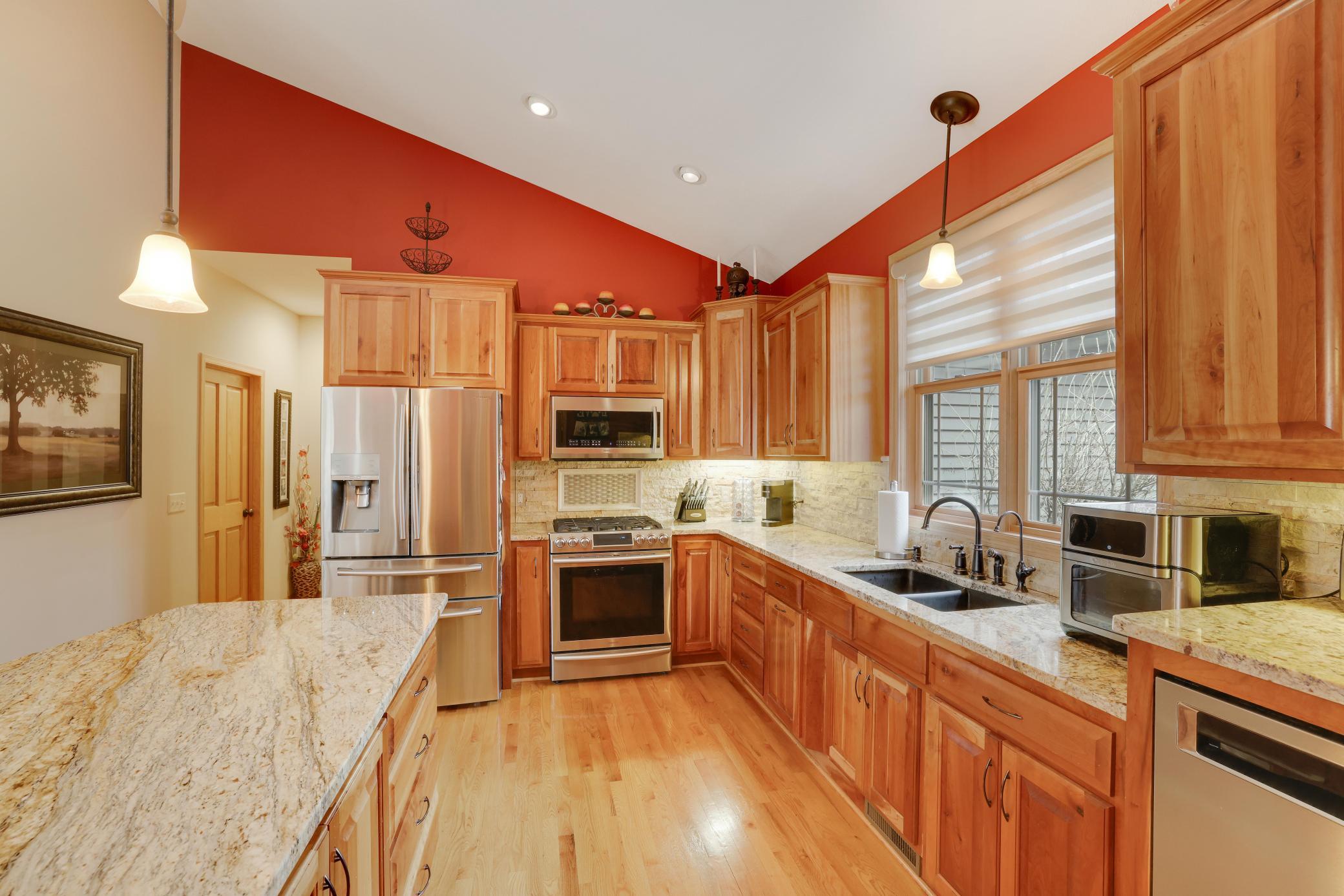 Beautiful Kitchen W/ Stainless Steel Appliances and Quartz Counters