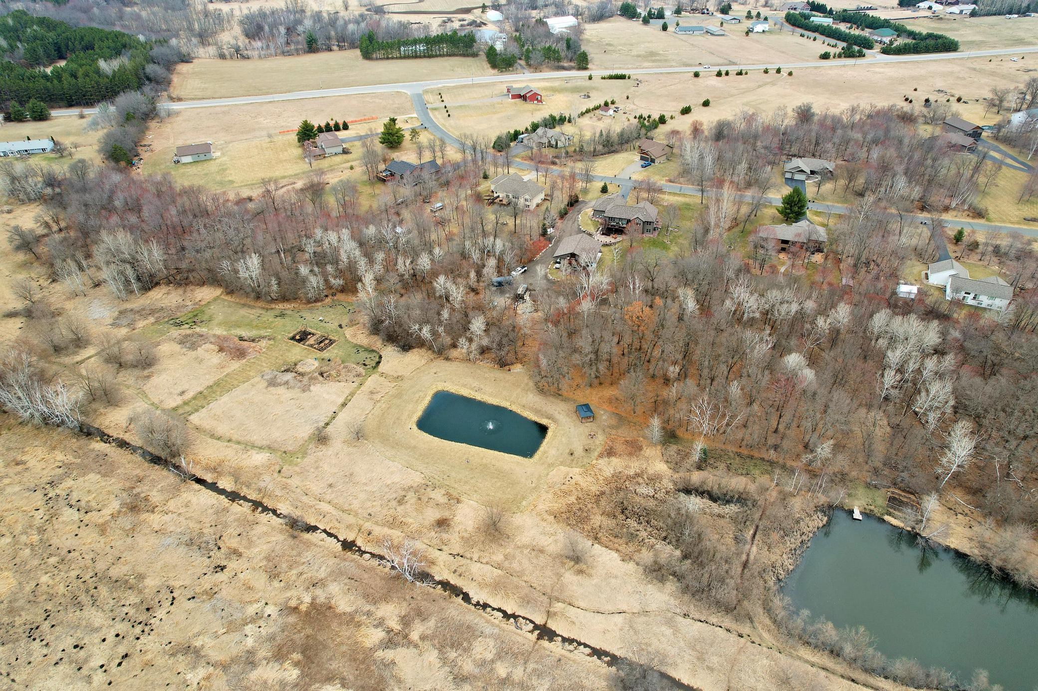 Large Pond in Backyard w/ Fountain