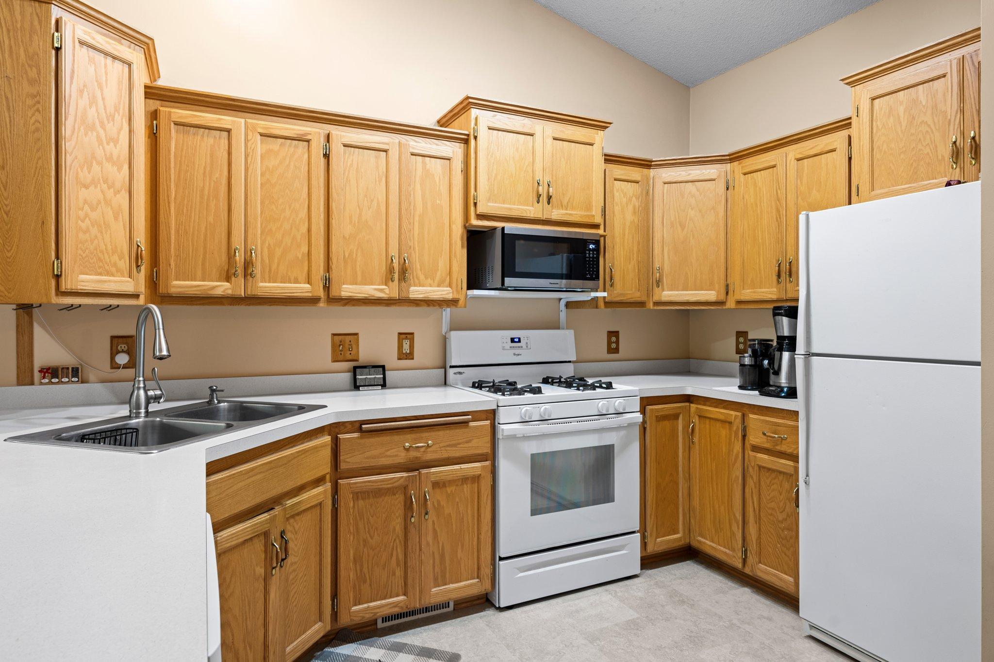 Beautiful wood cabinets 6318_Cavell_Ct-108.jpg