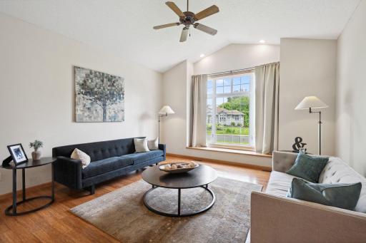 Front living room with vaulted ceilings, recessed lighting