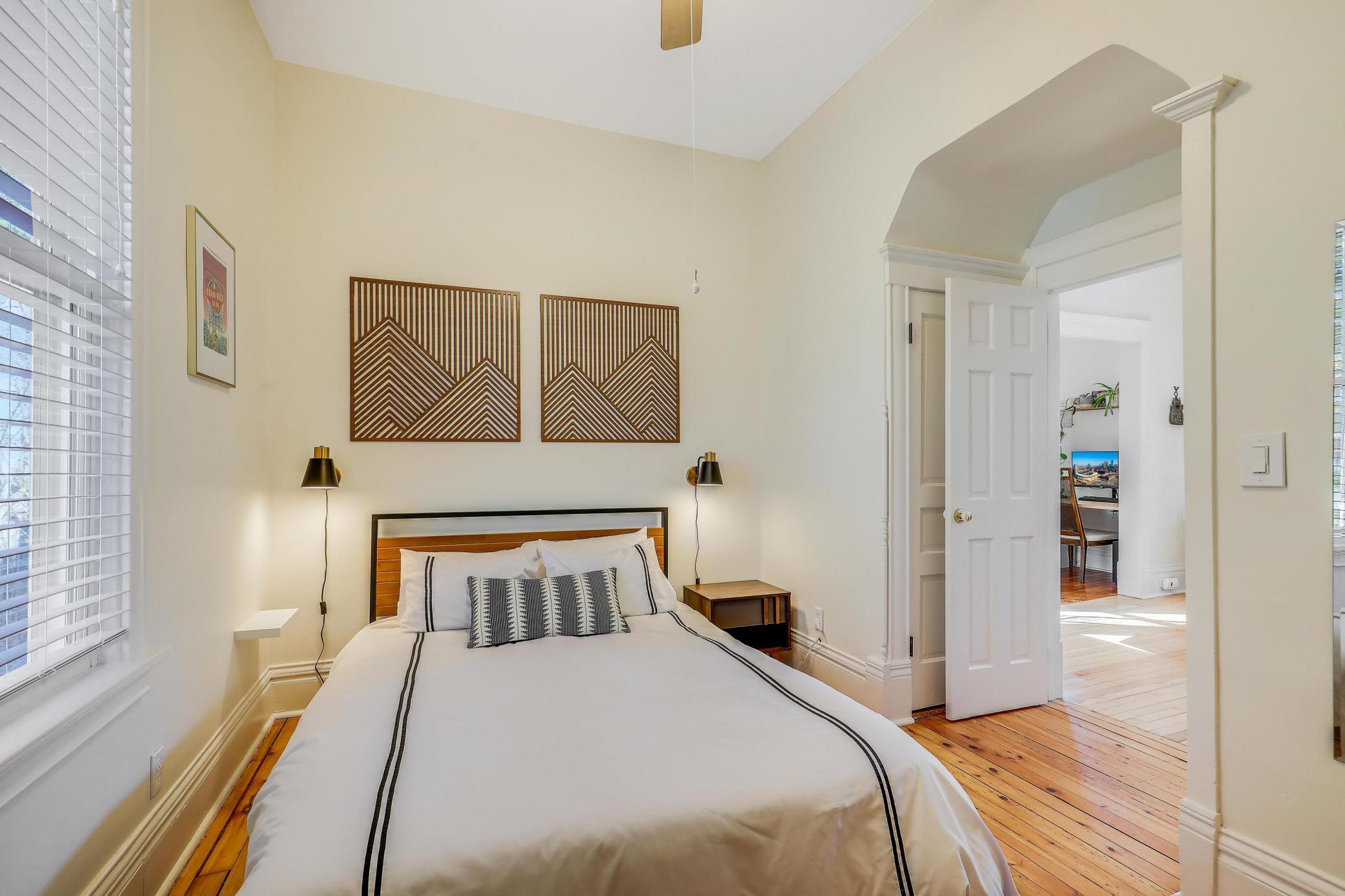 Main floor bedroom door to dining room