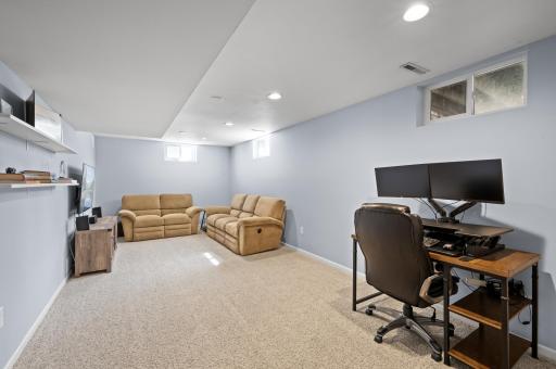 Large finished basement rec room for movie nights, games or work from home.