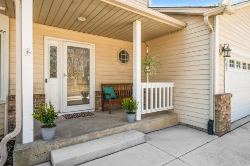 Front porch adds a ton of curb appeal, not to mention a nice little spot to sit with a beverage and watch the neighborhood! Note all driveway and front concrete was replaced in 2022 as well as the garage floor.