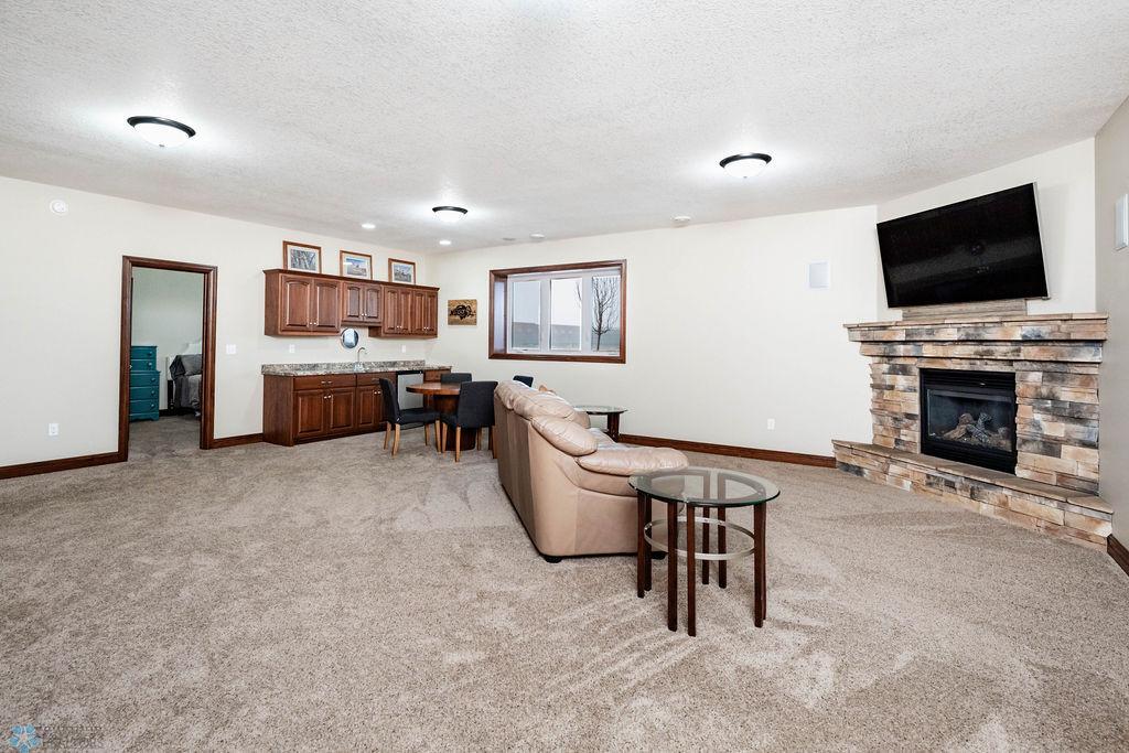 Basement family room with large window offering lots of light