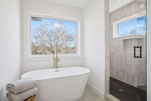 Free Standing Tub & Beautifully Tiled Walk-in Serenity Shower