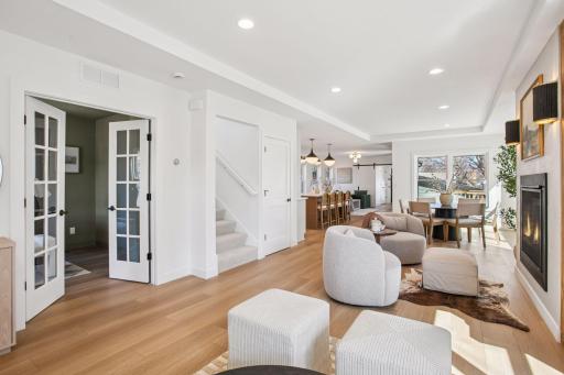 Every detail has been curatedâfrom the rich flooring, tile, and paint selections to the stunning lighting and custom fireplace.