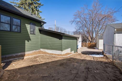 RARE Attached garage with extensive additional storage.