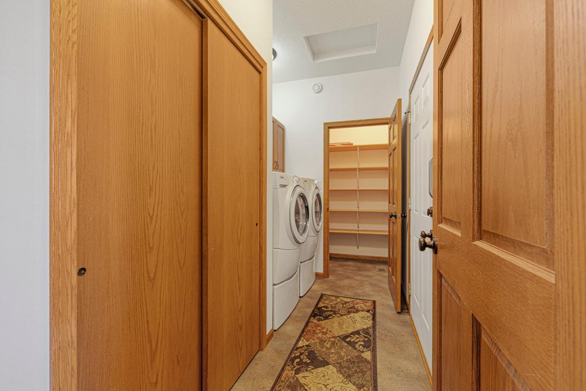 9 Garage entry_Laundry_storage.jpg