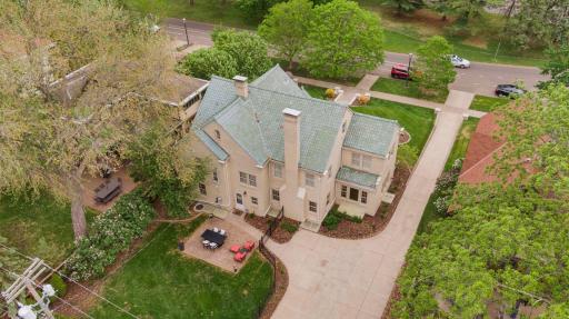 The tile roof offers excellent durability and preserves the home's architectural integrity. In 2011, the underlayment was replaced and the original tiles reinstalled, along with new gutter trays and exterior trim paint!
