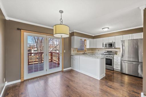 Doors from the dining room leads out to the deck