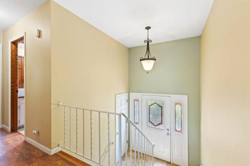 The front foyer is bright and cheerful with a welcoming door!