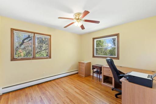 The second bedroom on the upper (main) floor and has beautiful hardwood floors!
