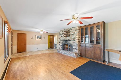 Let's head downstairs and take a look at this HUGE family room! The gas fireplace offers added warmth on those cooler nights. The built-in cabinet is perfect for storing the trophies, books and fun trinkets you'll be adding throughout the years!