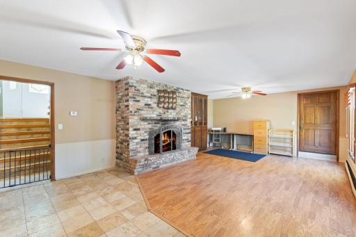 Wonderful space -- family room on the lower level. The door you see is a second door that leads to the attached garage.