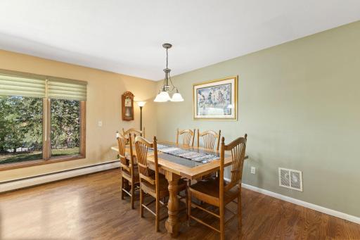 You'll love entertaining in this space -- large enough to hold a table for six (shown), and PLENTY of room to add more!!