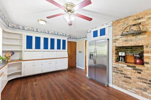 The door on the far corner leads to the attached garage. **The refrigerator and dishwasher are newer!