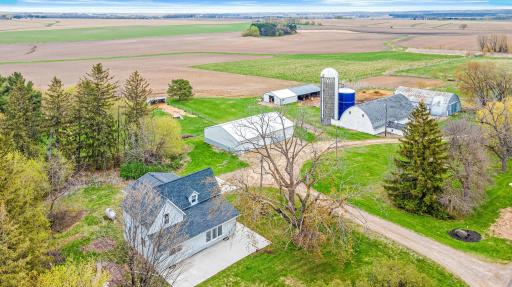 House, Lester outbuilding, barn, loafing shed, horse barn and quonset building.