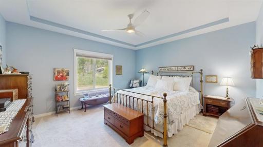 Spacious owner's suite with private bathroom and walk-in closet