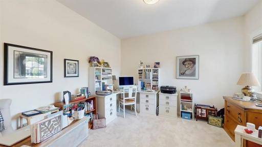 Main level bedroom currently functioning as home office