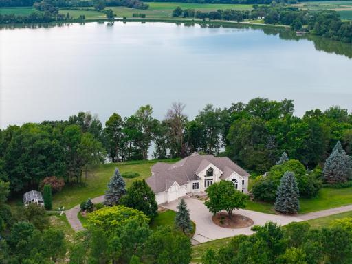 Opportunity on Cynthia Lake – The land features a gently rolling landscape with a mix of wooded areas and open prairie.