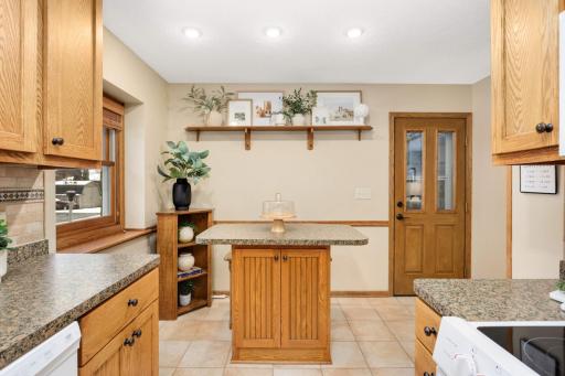 Kitchen dinette space with center island.