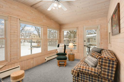 Picture windows on all walls and door to deck.
