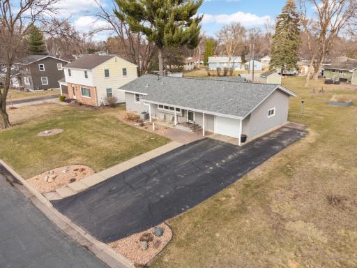 Great curb appeal with extra parking on side of garage!