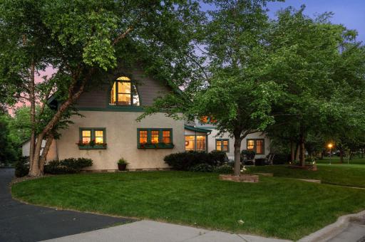 Welcome to 1409 Midway Parkway! Beautifully landscaped with vibrant greenery and standout curb appeal.