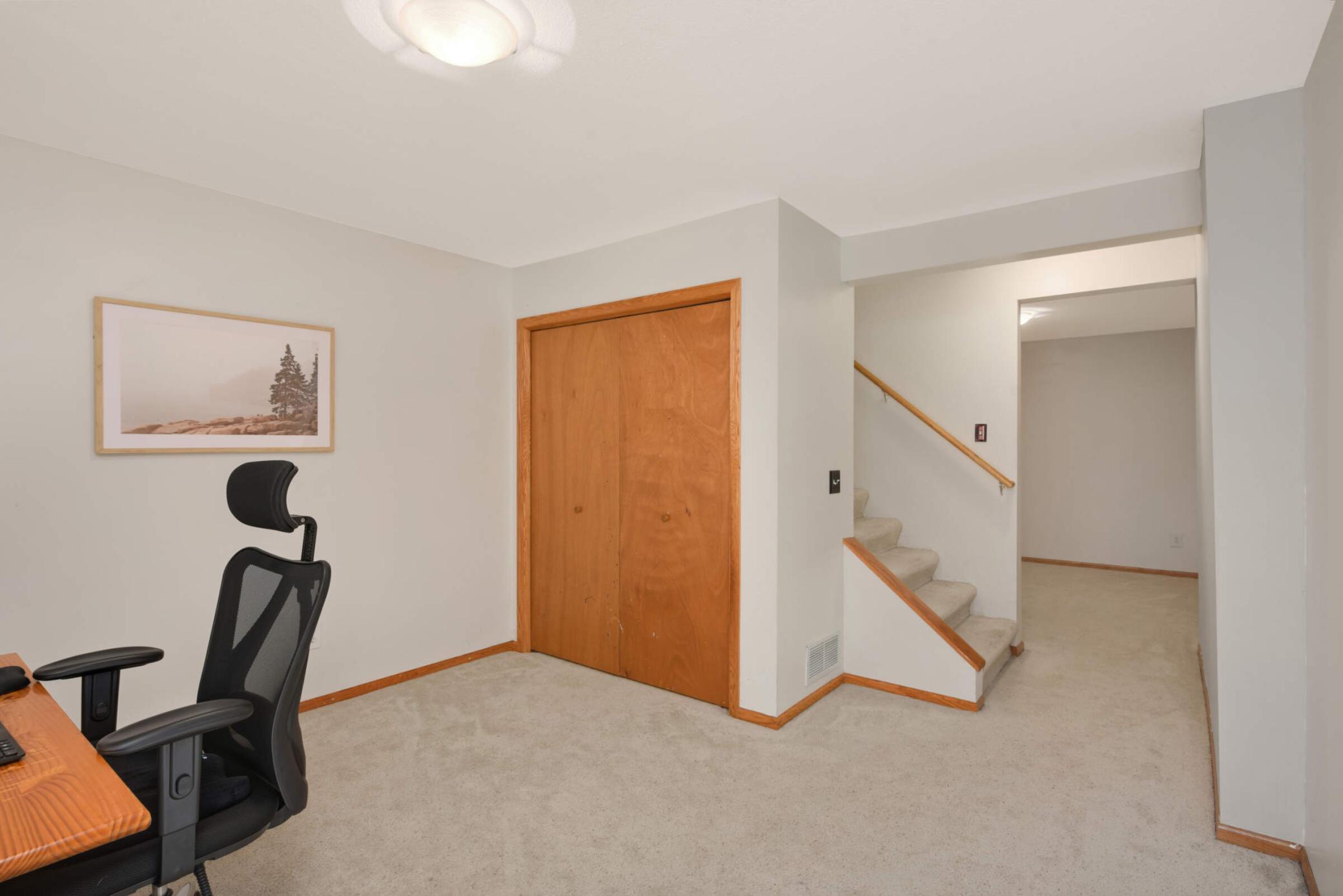 Another view of the lower level adjoining exercise room.